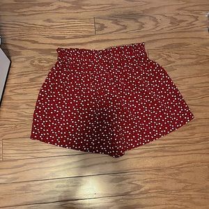 red shorts with white dot pattern